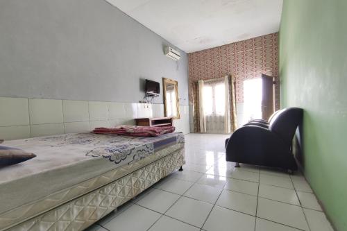 Imagen de la habitación del Hotel SPOT ON 91105 Salsabila. Foto 19