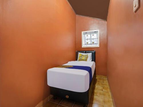 Imagen de la habitación del Hotel SPOT ON 91107 Villa Galaxy Resort. Foto 20