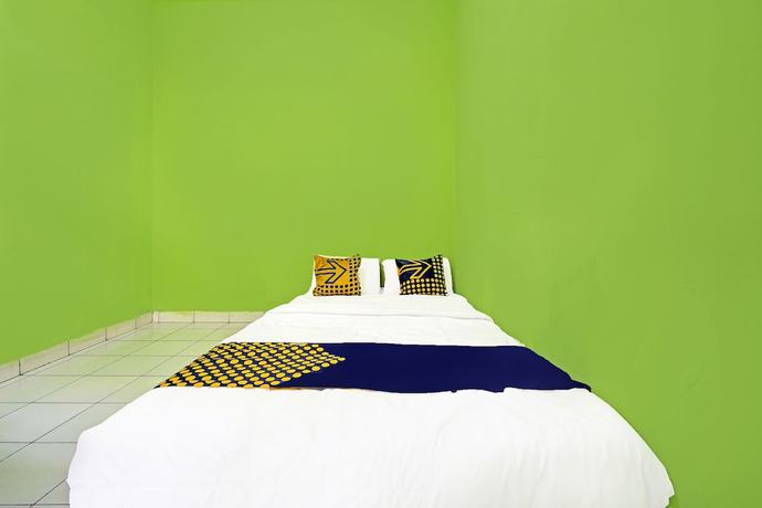 Imagen de la habitación del Hotel SPOT ON 91325 Pondok Hijau Guest House Syariah. Foto 2