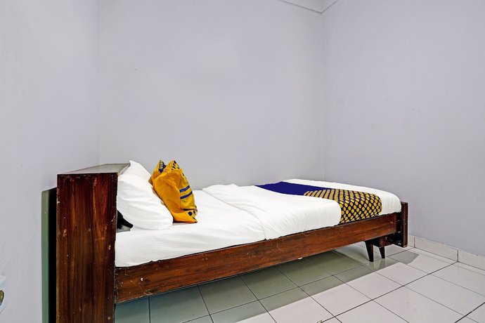 Imagen de la habitación del Hotel SPOT ON 91325 Pondok Hijau Guest House Syariah. Foto 3