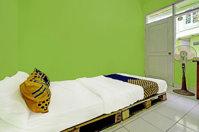 Imagen de la habitación del Hotel SPOT ON 91325 Pondok Hijau Guest House Syariah. Foto 6