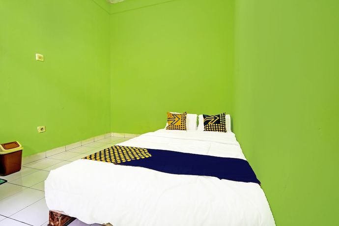Imagen de la habitación del Hotel SPOT ON 91325 Pondok Hijau Guest House Syariah. Foto 8