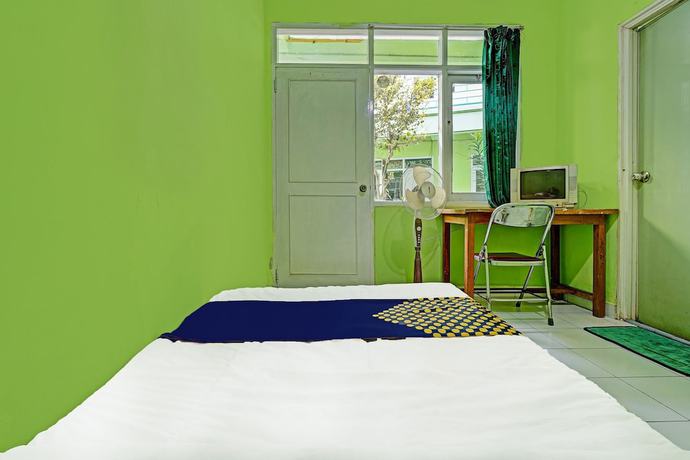 Imagen de la habitación del Hotel SPOT ON 91325 Pondok Hijau Guest House Syariah. Foto 9