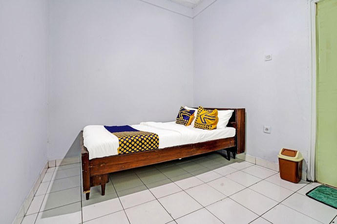 Imagen de la habitación del Hotel SPOT ON 91325 Pondok Hijau Guest House Syariah. Foto 10