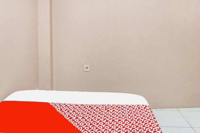 Imagen de la habitación del Hotel SPOT ON 91336 Guesthouse Tarumanegara. Foto 19