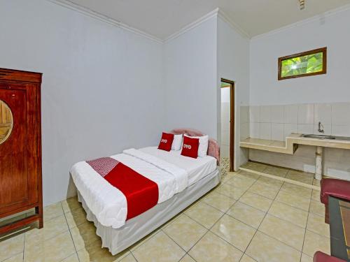 Imagen de la habitación del Hotel SPOT ON 91372 Wisma Bulin. Foto 19