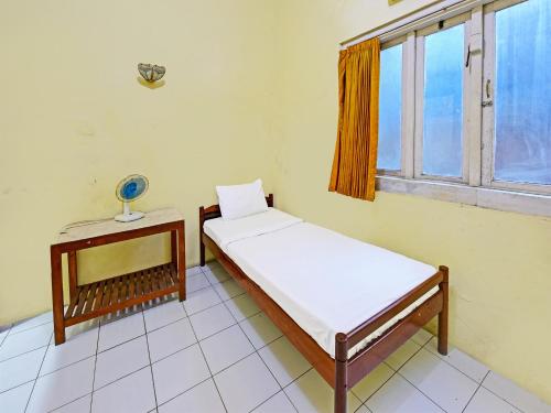 Imagen de la habitación del Hotel SPOT ON 91372 Wisma Bulin. Foto 20