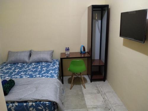 Imagen general del Hotel SPOT ON 91402 Home\'59 Tegal Danas. Foto 11