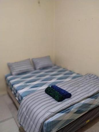 Imagen general del Hotel SPOT ON 91402 Home\'59 Tegal Danas. Foto 12