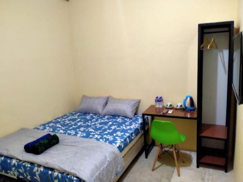 Imagen general del Hotel SPOT ON 91402 Home\'59 Tegal Danas. Foto 16
