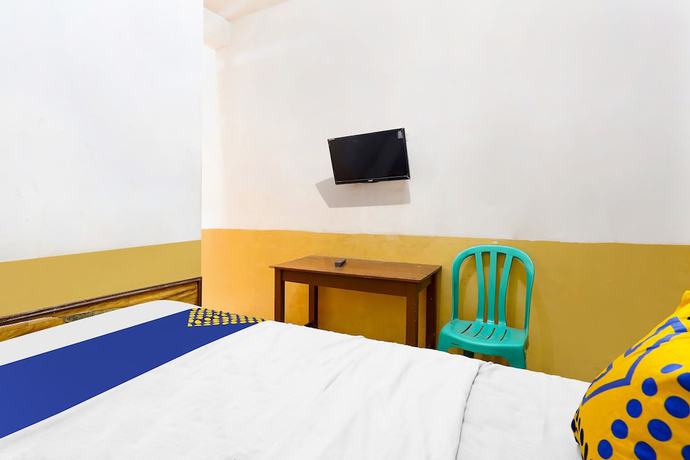 Imagen de la habitación del Hotel SPOT ON 91444 Arimbi. Foto 4