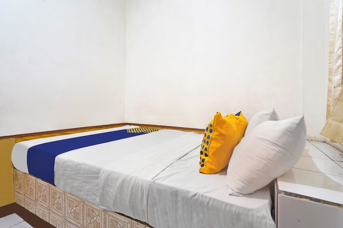 Imagen de la habitación del Hotel SPOT ON 91444 Arimbi. Foto 5