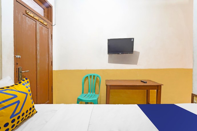Imagen de la habitación del Hotel SPOT ON 91444 Arimbi. Foto 9