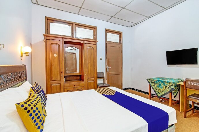 Imagen de la habitación del Hotel SPOT ON 91471 Syariah Wisma Uin Walisongo. Foto 18