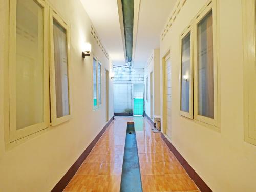 Imagen general del Hotel SPOT ON 91504 De Vila Ungu Syariah. Foto 8