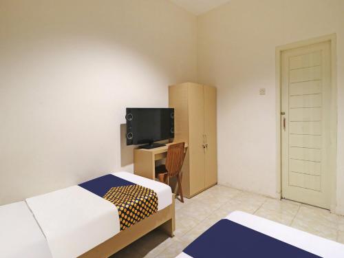 Imagen general del Hotel SPOT ON 91504 De Vila Ungu Syariah. Foto 12