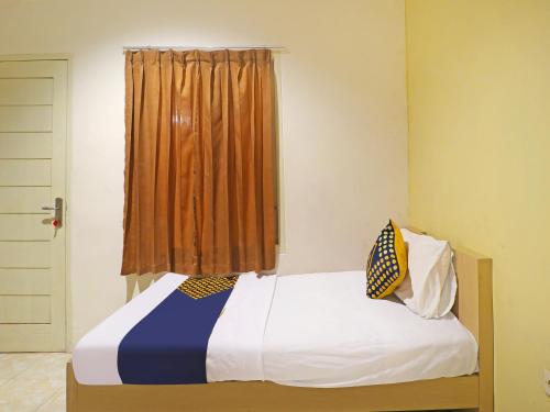 Imagen general del Hotel SPOT ON 91504 De Vila Ungu Syariah. Foto 13