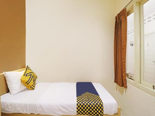 Imagen general del Hotel SPOT ON 91504 De Vila Ungu Syariah. Foto 17