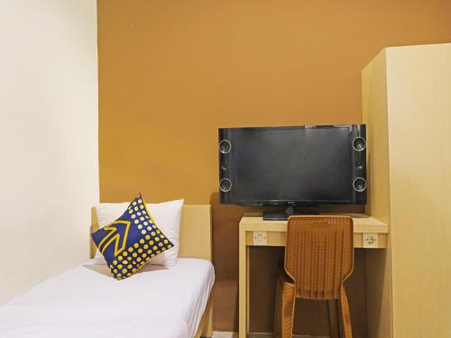 Imagen general del Hotel SPOT ON 91504 De Vila Ungu Syariah. Foto 18