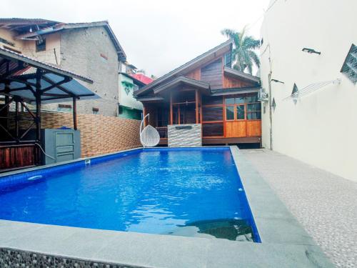Imagen general del Hotel SPOT ON 91606 Nadin Guest House Syariah. Foto 9