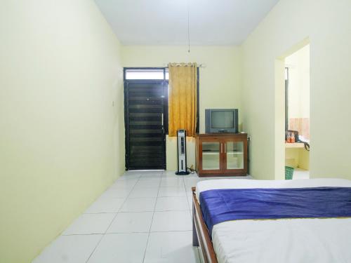 Imagen general del Hotel SPOT ON 91606 Nadin Guest House Syariah. Foto 12