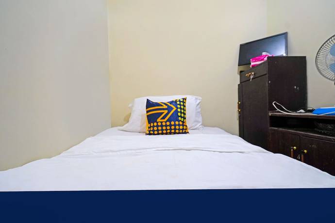 Imagen de la habitación del Hotel SPOT ON 91783 Urban Syariah Residence. Foto 4