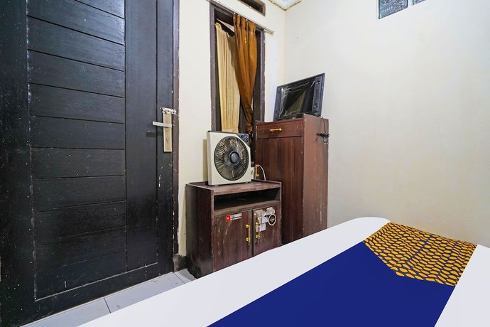 Imagen de la habitación del Hotel SPOT ON 91783 Urban Syariah Residence. Foto 5