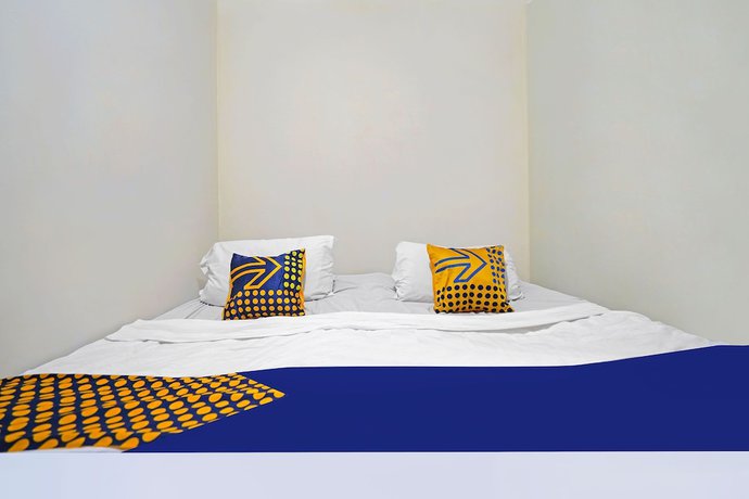 Imagen de la habitación del Hotel SPOT ON 91783 Urban Syariah Residence. Foto 9