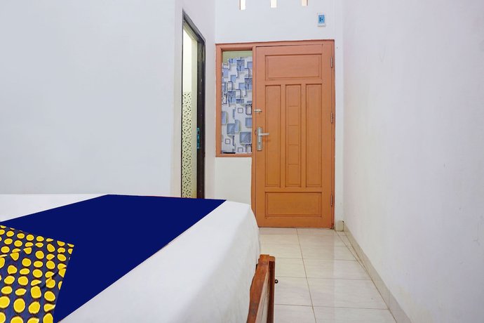 Imagen de la habitación del Hotel SPOT ON 91786 Kilana Homestay. Foto 5
