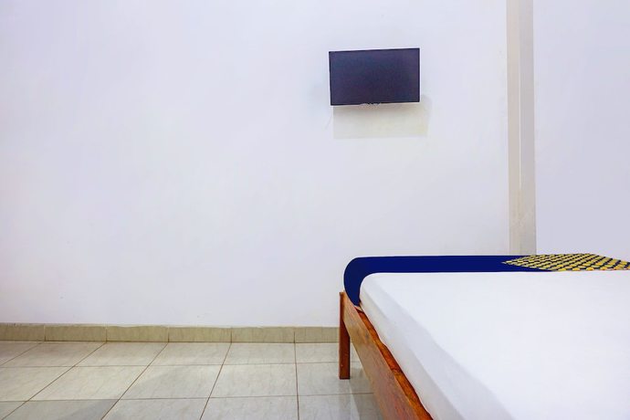 Imagen de la habitación del Hotel SPOT ON 91786 Kilana Homestay. Foto 8