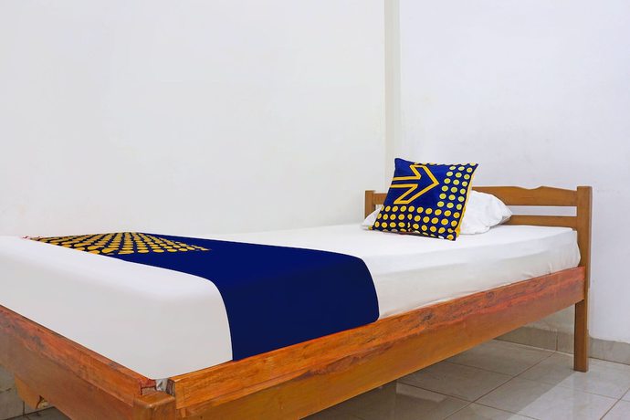 Imagen de la habitación del Hotel SPOT ON 91786 Kilana Homestay. Foto 11