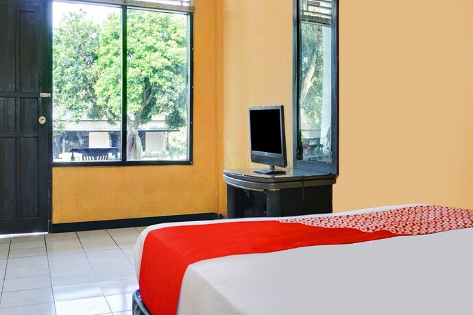 Imagen de la habitación del Hotel SPOT ON 91797 Mutiara Guest House. Foto 20