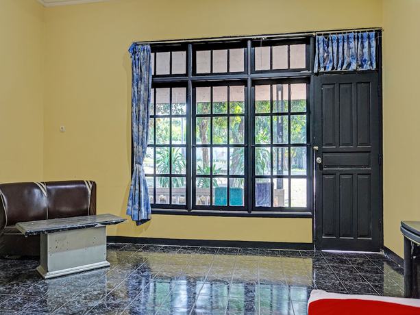Imagen de la habitación del Hotel SPOT ON 91798 Grand Mutiara. Foto 9