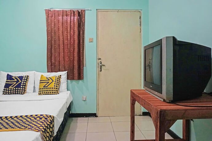 Imagen de la habitación del Hotel SPOT ON 91860 Amazon Homestay Syariah 2. Foto 19