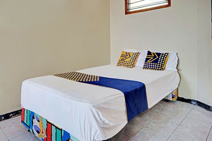 Imagen de la habitación del Hotel SPOT ON 91890 Kost Kalasan Syariah. Foto 18