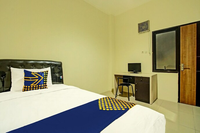 Imagen de la habitación del Hotel SPOT ON 91890 Kost Kalasan Syariah. Foto 19