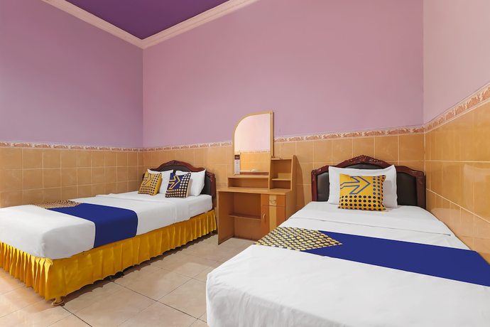 Imagen de la habitación del Hotel SPOT ON 91930 Citra Dewi 4 Manunggal. Foto 4