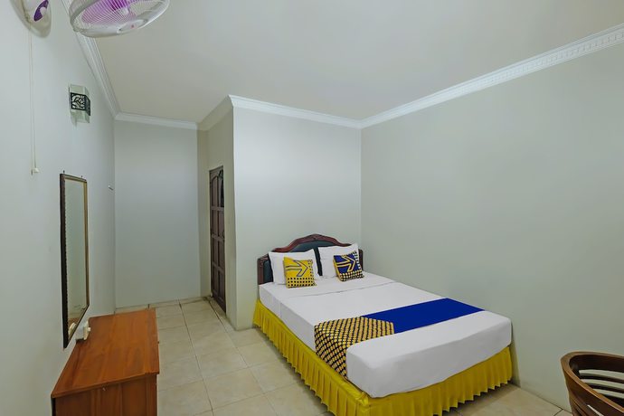 Imagen de la habitación del Hotel SPOT ON 91930 Citra Dewi 4 Manunggal. Foto 8