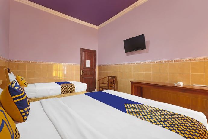 Imagen de la habitación del Hotel SPOT ON 91930 Citra Dewi 4 Manunggal. Foto 9
