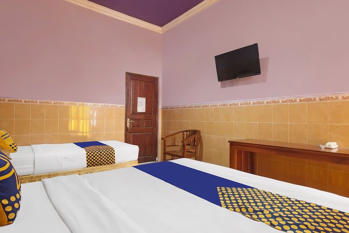 Imagen de la habitación del Hotel SPOT ON 91930 Citra Dewi 4 Manunggal. Foto 11