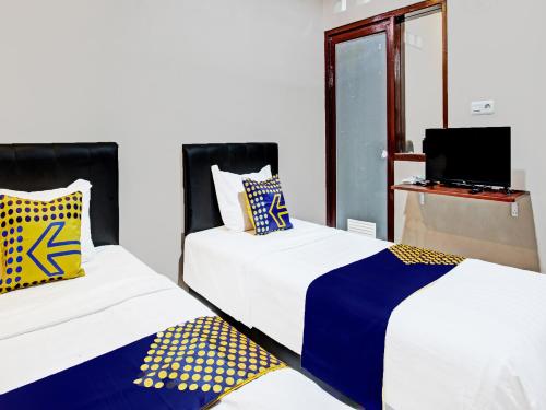 Imagen general del Hotel SPOT ON 91932 Guest House Mustika Syariah. Foto 14
