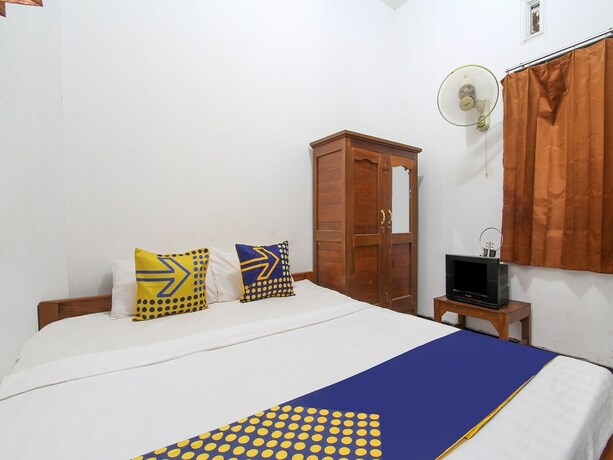 Imagen de la habitación del Hotel SPOT ON 91935 Hellena Guesthouse. Foto 19