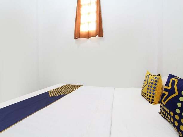 Imagen de la habitación del Hotel SPOT ON 91935 Hellena Guesthouse. Foto 20