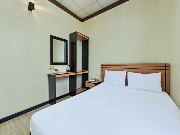 Imagen de la habitación del Hotel SPOT ON 91970 Biru Homestay. Foto 1