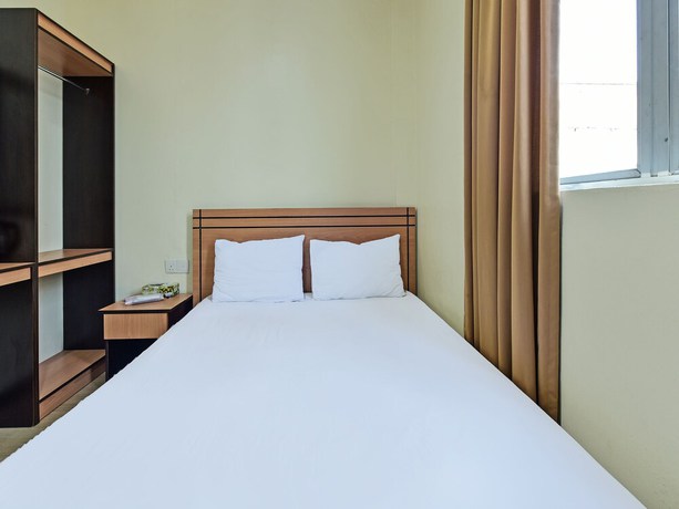 Imagen de la habitación del Hotel SPOT ON 91970 Biru Homestay. Foto 4