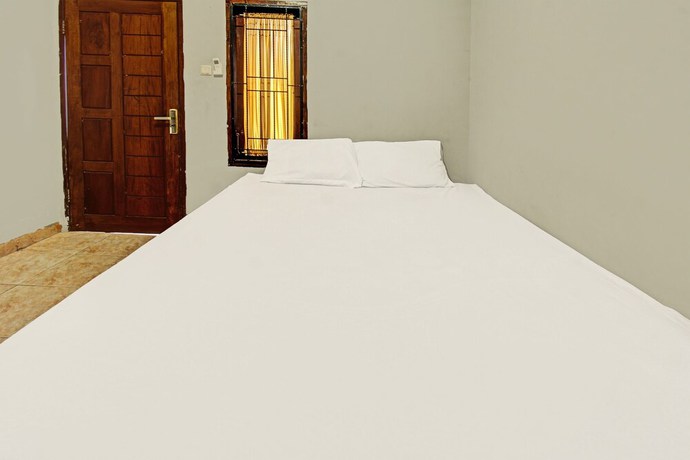 Imagen de la habitación del Hotel SPOT ON 91981 Diwi Homestay. Foto 5