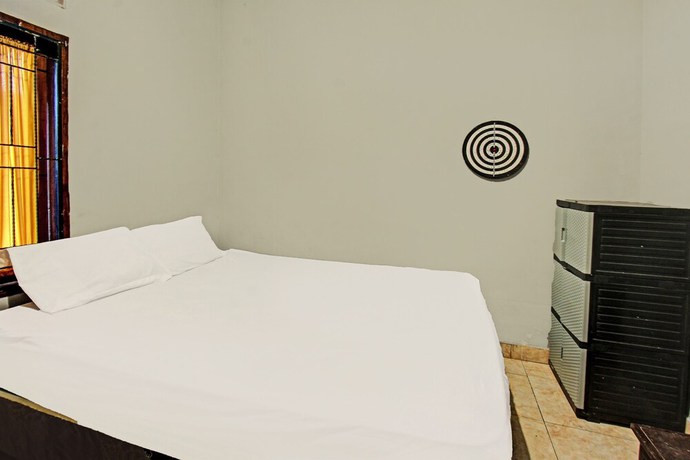 Imagen de la habitación del Hotel SPOT ON 91981 Diwi Homestay. Foto 7