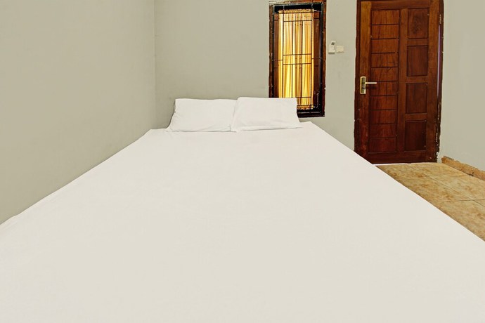 Imagen de la habitación del Hotel SPOT ON 91981 Diwi Homestay. Foto 8