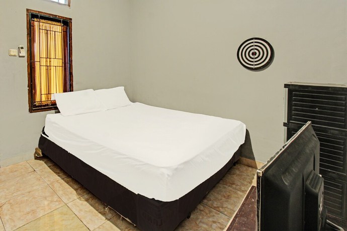 Imagen de la habitación del Hotel SPOT ON 91981 Diwi Homestay. Foto 11