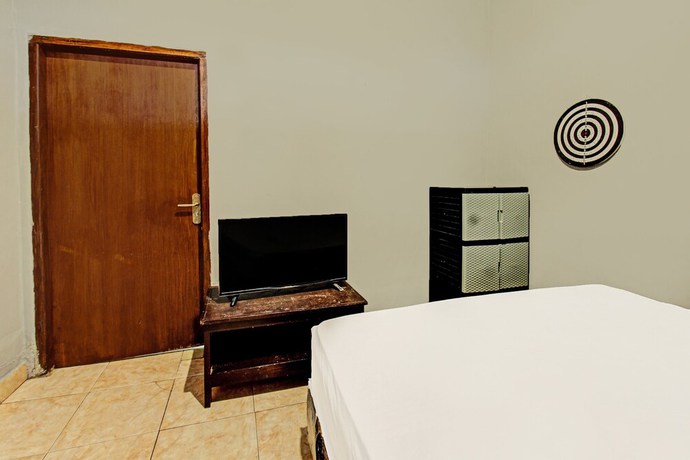 Imagen de la habitación del Hotel SPOT ON 91981 Diwi Homestay. Foto 12